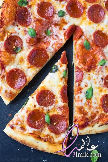 طريقة عمل البيتزا,عمل البيتزا,طريقة عمل البيتزا الايطالى,طريقه عمل البيتزا السريعه