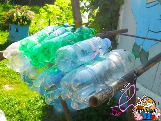 كيفية صنع نظام الري من زجاجة بلاستيكية،حفنة من الزجاجات البلاستيكية 3almik.com_11_20_159