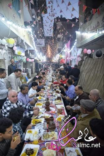 بالصور أطول مائدة أفطار فى المطرية 3almik.com_13_22_165